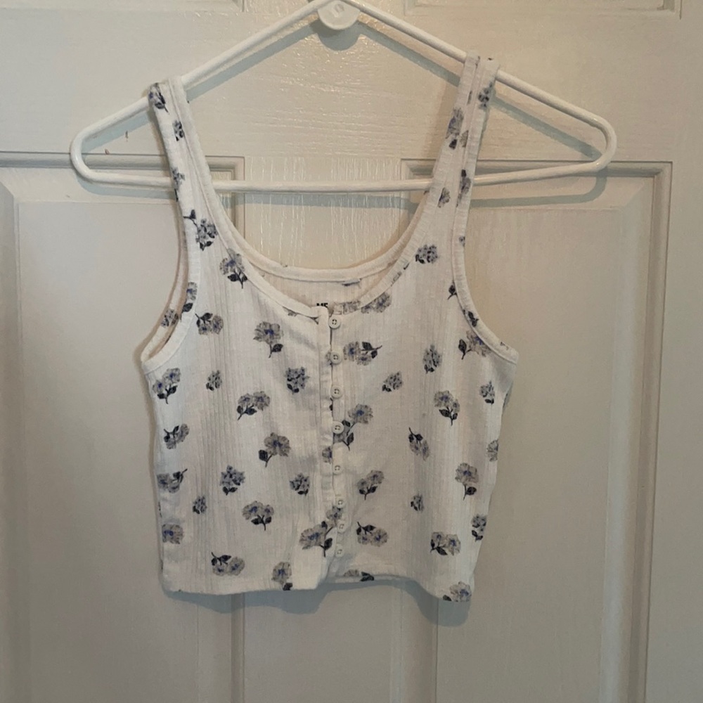 White crop tank top with blue and grey flowers